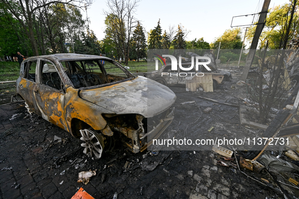 Cars are being destroyed by the Russian missile attack in central Vilniansk, Zaporizhzhia region, southern Ukraine, on June 29, 2024. Russia...