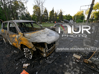 Cars are being destroyed by the Russian missile attack in central Vilniansk, Zaporizhzhia region, southern Ukraine, on June 29, 2024. Russia...