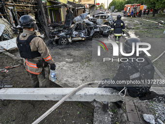 Rescuers are partaking in a response effort to the Russian missile attack in central Vilniansk, Zaporizhzhia region, southern Ukraine, on Ju...