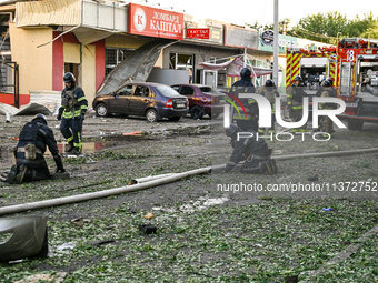 Rescuers are partaking in a response effort to the Russian missile attack in central Vilniansk, Zaporizhzhia region, southern Ukraine, on Ju...