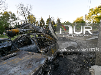 Cars are being destroyed by the Russian missile attack in central Vilniansk, Zaporizhzhia region, southern Ukraine, on June 29, 2024. Russia...