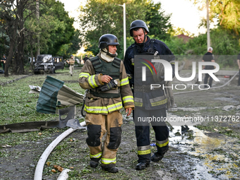 Rescuers are partaking in a response effort to the Russian missile attack in central Vilniansk, Zaporizhzhia region, southern Ukraine, on Ju...