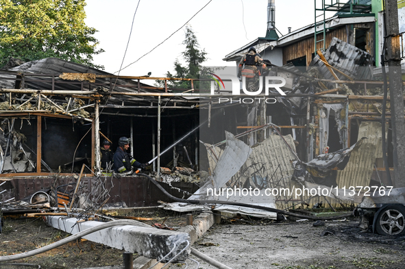 Rescuers are partaking in a response effort to the Russian missile attack in central Vilniansk, Zaporizhzhia region, southern Ukraine, on Ju...