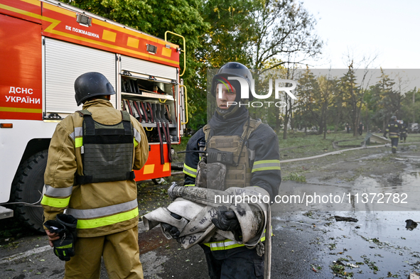 Rescuers are partaking in a response effort to the Russian missile attack in central Vilniansk, Zaporizhzhia region, southern Ukraine, on Ju...