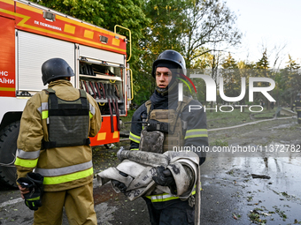 Rescuers are partaking in a response effort to the Russian missile attack in central Vilniansk, Zaporizhzhia region, southern Ukraine, on Ju...