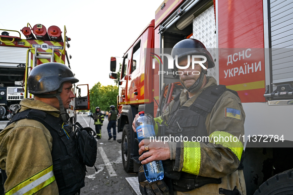 Rescuers are partaking in a response effort to the Russian missile attack in central Vilniansk, Zaporizhzhia region, southern Ukraine, on Ju...