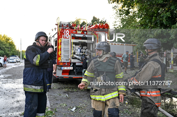 Rescuers are partaking in a response effort to the Russian missile attack in central Vilniansk, Zaporizhzhia region, southern Ukraine, on Ju...