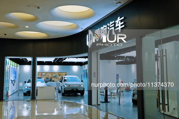 A new energy vehicle is being displayed at a Leapmotor New energy vehicle store in Tianjin, China, on June 30, 2024. 