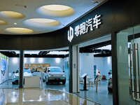 A new energy vehicle is being displayed at a Leapmotor New energy vehicle store in Tianjin, China, on June 30, 2024. (