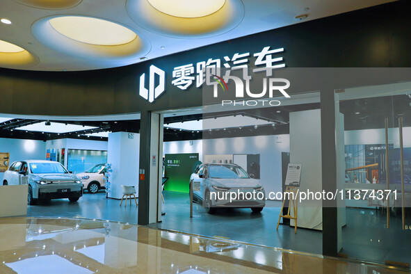 A new energy vehicle is being displayed at a Leapmotor New energy vehicle store in Tianjin, China, on June 30, 2024. 