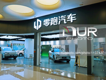 A new energy vehicle is being displayed at a Leapmotor New energy vehicle store in Tianjin, China, on June 30, 2024. (