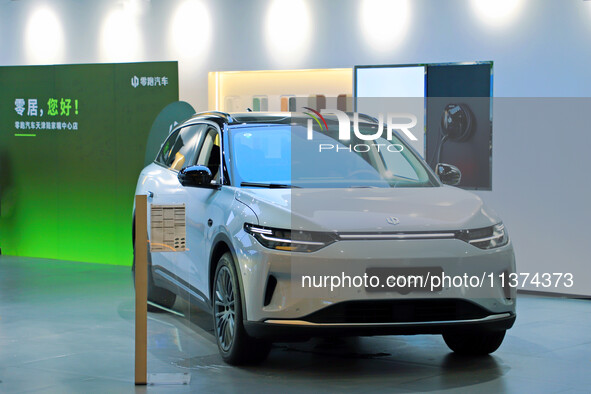 A new energy vehicle is being displayed at a Leapmotor New energy vehicle store in Tianjin, China, on June 30, 2024. 