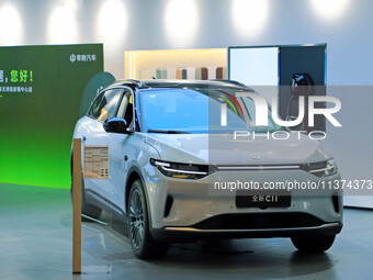 A new energy vehicle is being displayed at a Leapmotor New energy vehicle store in Tianjin, China, on June 30, 2024. (