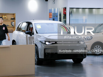 A new energy vehicle is being displayed at a Leapmotor New energy vehicle store in Tianjin, China, on June 30, 2024. (