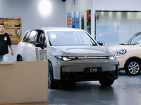 A new energy vehicle is being displayed at a Leapmotor New energy vehicle store in Tianjin, China, on June 30, 2024. (