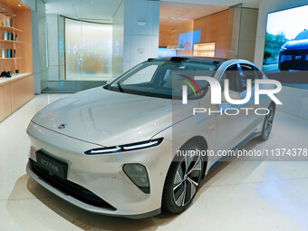 A new energy vehicle is being displayed at a NIO New energy vehicle store in Tianjin, China, on June 30, 2024. (