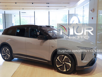 A new energy vehicle is being displayed at a NIO New energy vehicle store in Tianjin, China, on June 30, 2024. (