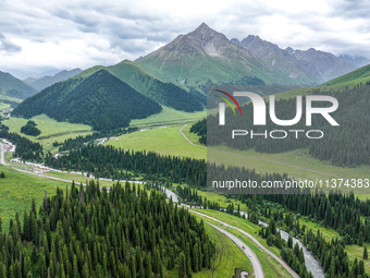 A view of the Duku Highway, known as one of the ''most beautiful highways in China,'' is being seen in Karamay, Xinjiang, China, on June 30,...