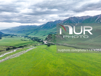 A view of the Duku Highway, known as one of the ''most beautiful highways in China,'' is being seen in Karamay, Xinjiang, China, on June 30,...