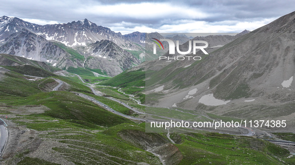 A view of the Duku Highway, known as one of the ''most beautiful highways in China,'' is being seen in Karamay, Xinjiang, China, on June 30,...