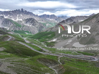 A view of the Duku Highway, known as one of the ''most beautiful highways in China,'' is being seen in Karamay, Xinjiang, China, on June 30,...