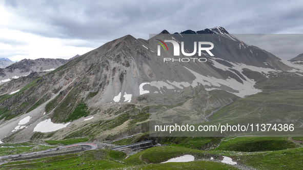 A view of the Duku Highway, known as one of the ''most beautiful highways in China,'' is being seen in Karamay, Xinjiang, China, on June 30,...