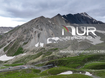 A view of the Duku Highway, known as one of the ''most beautiful highways in China,'' is being seen in Karamay, Xinjiang, China, on June 30,...