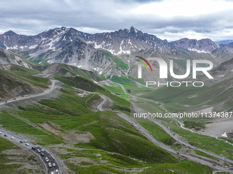 A view of the Duku Highway, known as one of the ''most beautiful highways in China,'' is being seen in Karamay, Xinjiang, China, on June 30,...