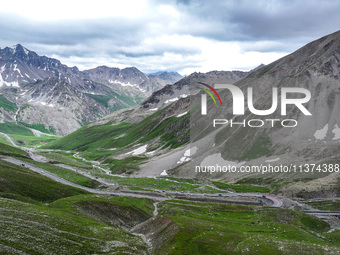 A view of the Duku Highway, known as one of the ''most beautiful highways in China,'' is being seen in Karamay, Xinjiang, China, on June 30,...