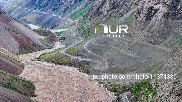 A view of the Duku Highway, known as one of the ''most beautiful highways in China,'' is being seen in Karamay, Xinjiang, China, on June 30,...