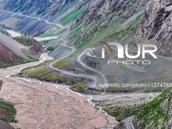 A view of the Duku Highway, known as one of the ''most beautiful highways in China,'' is being seen in Karamay, Xinjiang, China, on June 30,...