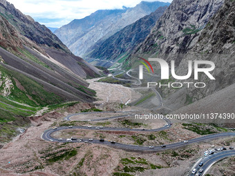 A view of the Duku Highway, known as one of the ''most beautiful highways in China,'' is being seen in Karamay, Xinjiang, China, on June 30,...