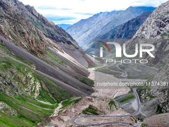 A view of the Duku Highway, known as one of the ''most beautiful highways in China,'' is being seen in Karamay, Xinjiang, China, on June 30,...