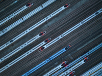 Bullet trains are stopping at the Nanjing section in Nanjing, Jiangsu province, China, in the early morning of July 1, 2024. (