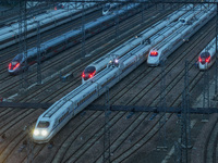 A bullet train is pulling out of the Nanjing Bullet train section in Nanjing, Jiangsu province, China, on July 1, 2024. (