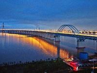 A photo taken on June 30, 2024, is showing the Shanghai-Suzhou-Nantong Yangtze River Railway Bridge in Nantong, China, on June 30, 2024. The...