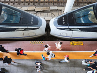 Passengers are getting off the train at Nanjing Railway Station in Nanjing, China, on July 1, 2024. (