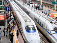 Passengers are traveling at Nanjing Railway Station in Nanjing, China, on July 1, 2024. (