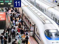 Passengers are traveling at Nanjing Railway Station in Nanjing, China, on July 1, 2024. (