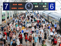 Passengers are getting off the train at Nanjing Railway Station in Nanjing, China, on July 1, 2024. (