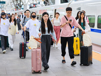 Passengers are traveling at Nanjing Railway Station in Nanjing, China, on July 1, 2024. (