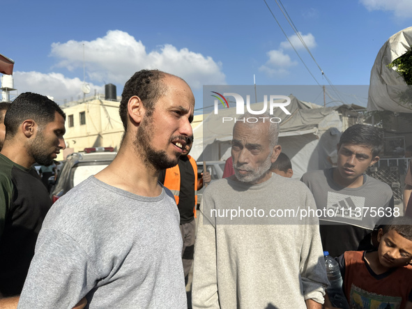 Palestinian men who are being detained by Israeli forces are arriving after their release for a check-up at the Al-Aqsa Martyrs Hospital in...