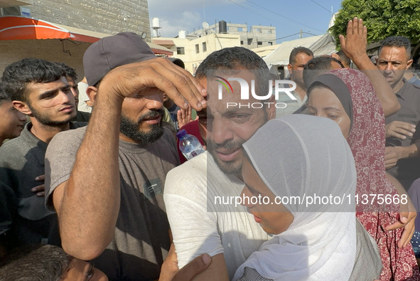 A Palestinian man who is being detained by Israeli forces is being welcomed by family and well-wishers as he is arriving after his release f...