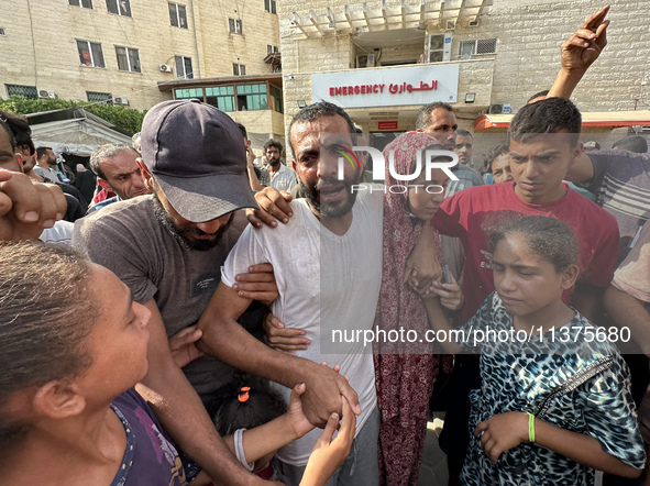 A Palestinian man who is being detained by Israeli forces is being welcomed by family and well-wishers as he is arriving after his release f...