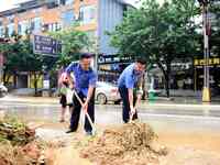 Villagers are removing silt formed by heavy rain in Congjiang county, Qiandongnan Miao and Dong autonomous prefecture, Southwest China's Gui...