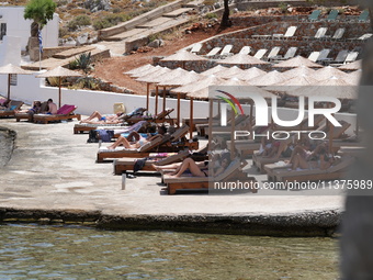 Tourists are enjoying the warm weather in Symi (