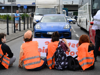 Climate activists from the Last Generation (Ostatnia Generacja) are blocking a main road to protest against the inaction of politicians towa...