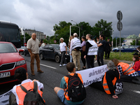 Climate activists from the Last Generation (Ostatnia Generacja) are blocking a main road to protest against the inaction of politicians towa...