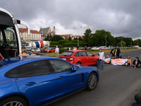 Climate activists from the Last Generation (Ostatnia Generacja) are blocking a main road to protest against the inaction of politicians towa...