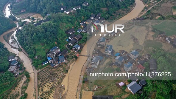 An aerial photo is showing the disaster site in Si 'an Village, Banlan town, Rongan County, Liuzhou City, South China's Guangxi Zhuang Auton...